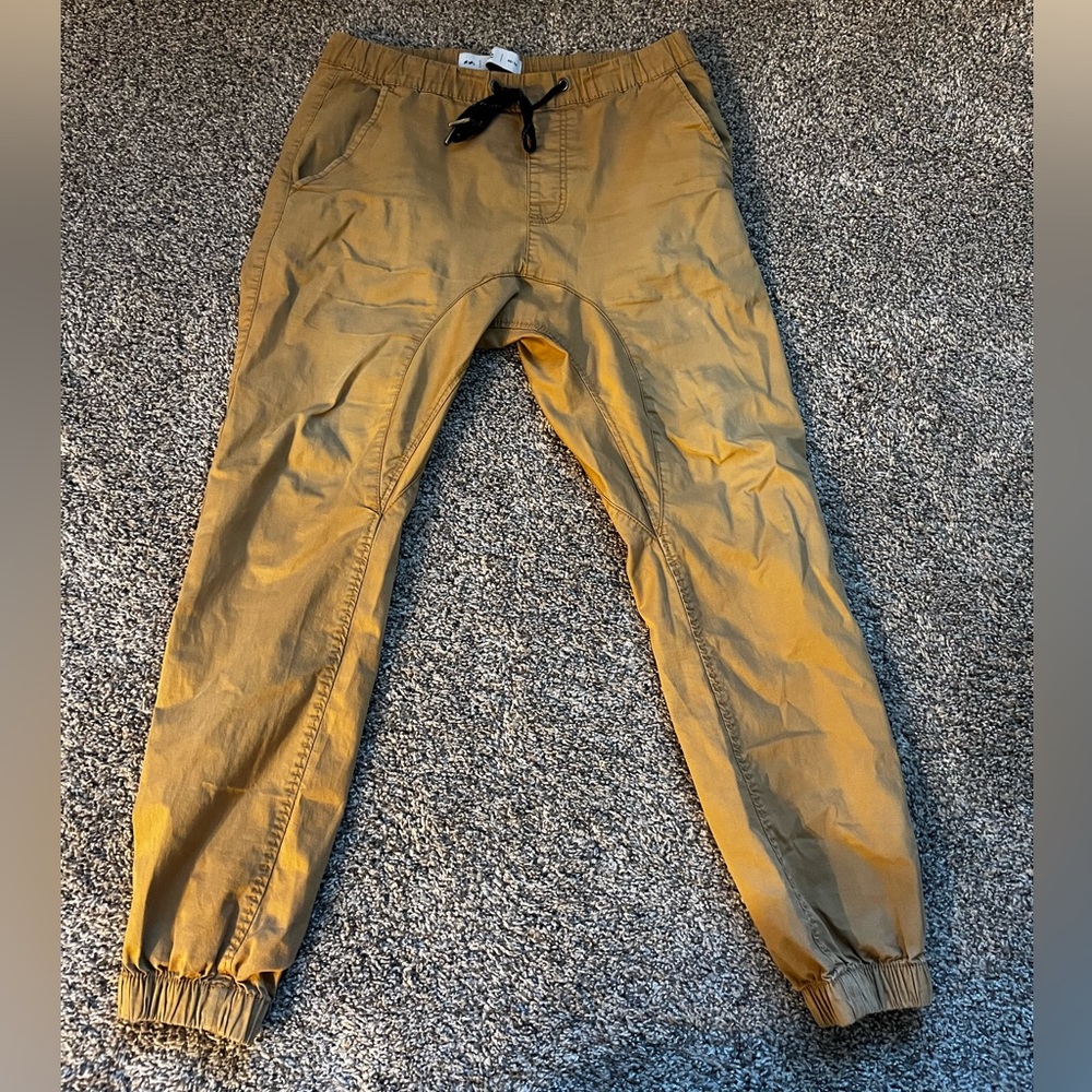 Drake Joggers, slight tear in rear